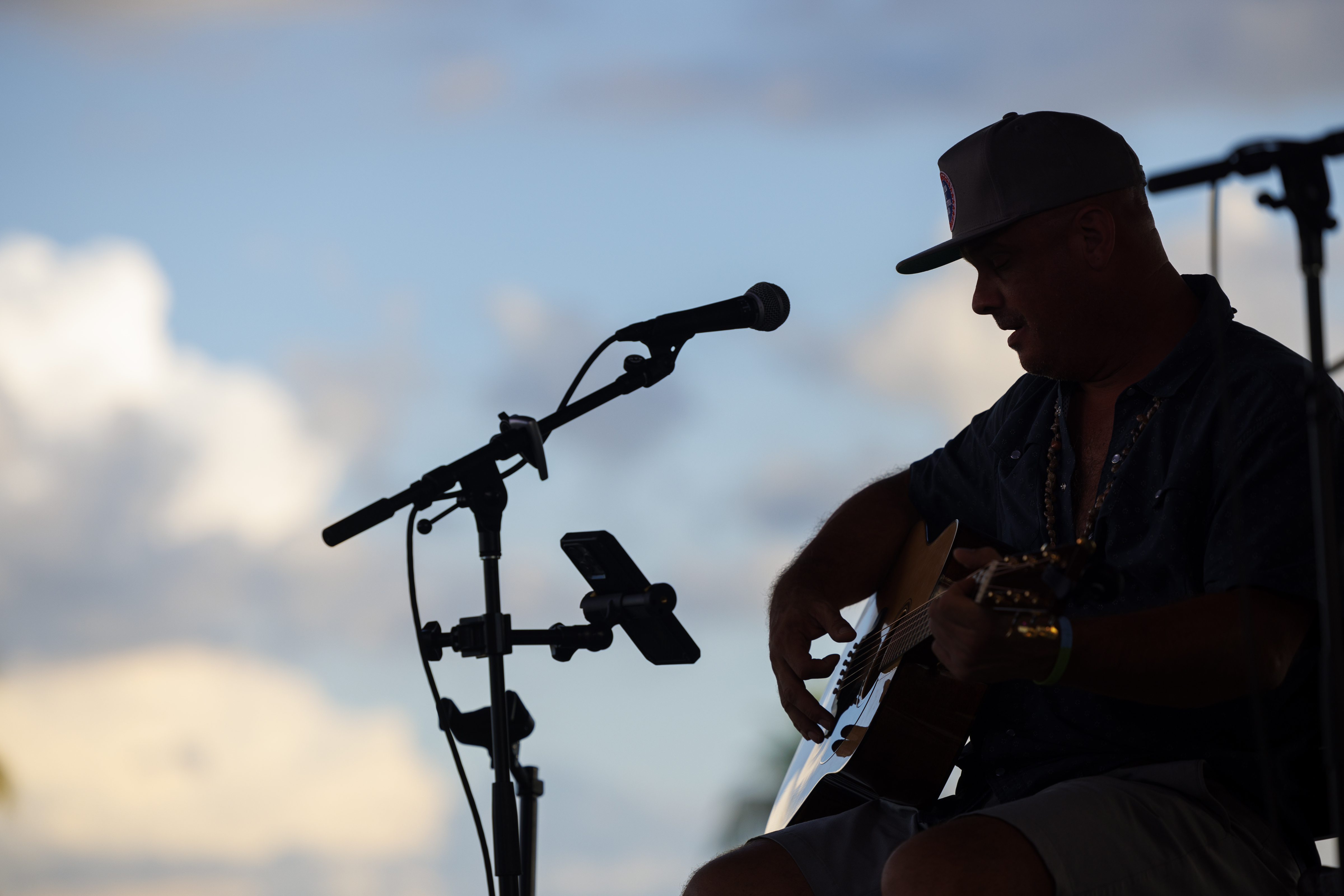 Matt Warren performing on stage in Cape Coral