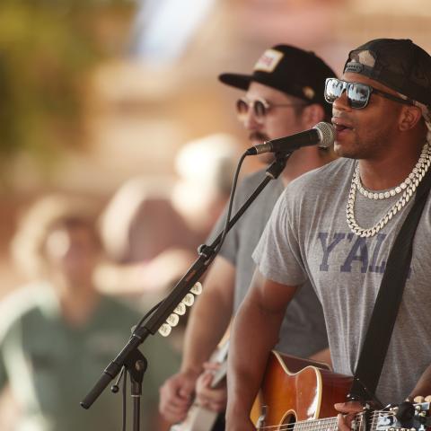 Jimmie Allen performing at Pink Shell