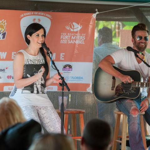 Thompson Square performs in front of a live audience.